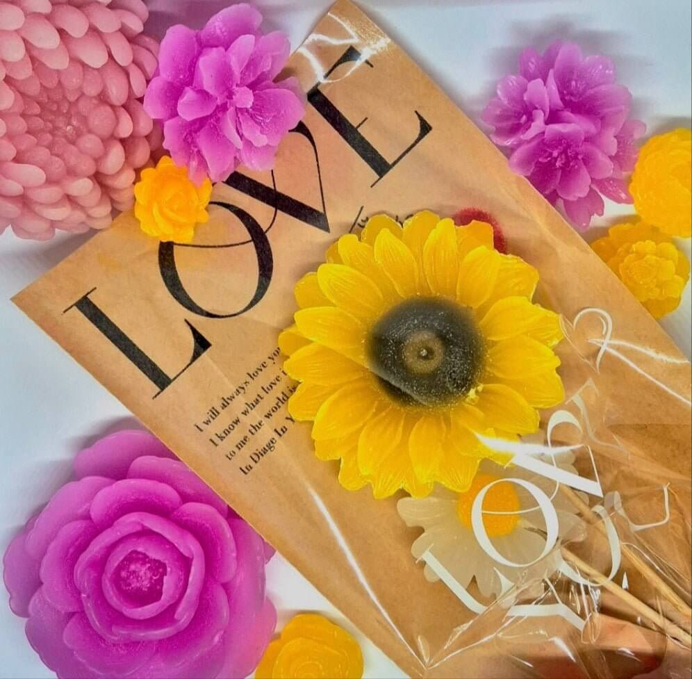 a variety of single wax melt flowers 