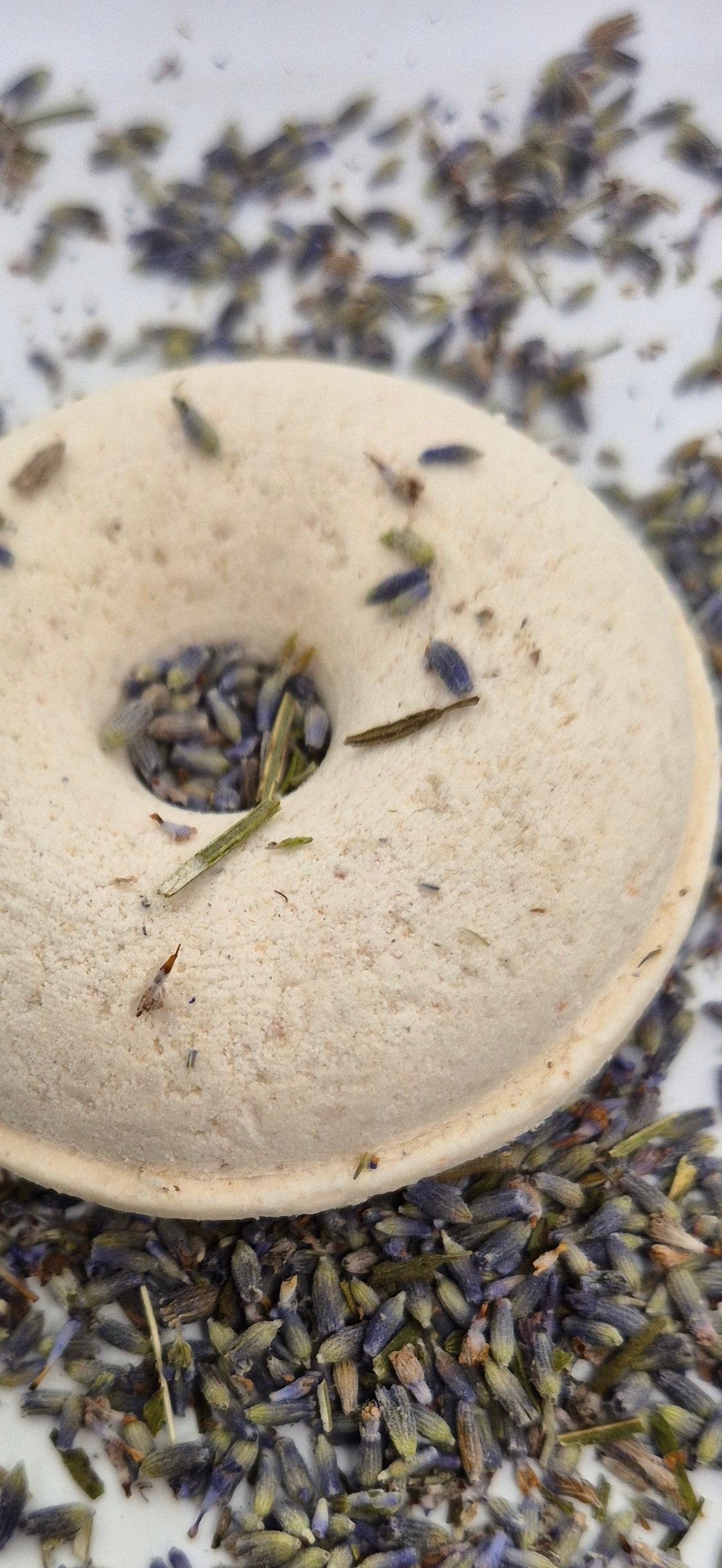 Lavender shower steamer on bed of lavender
