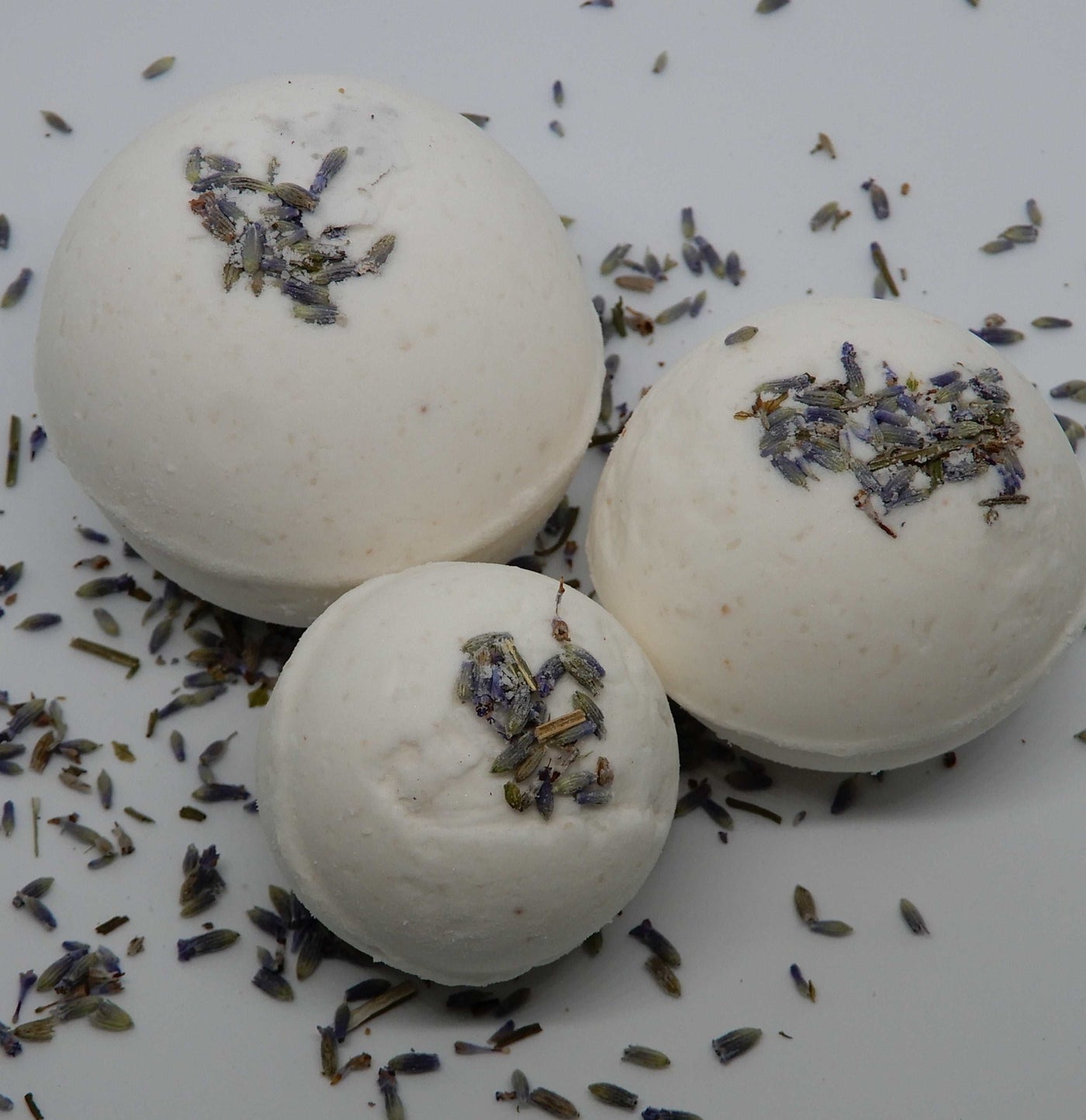 lavender bath bomb in three sizes, small medium and large 